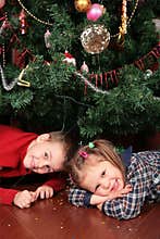 Children under christmas tree