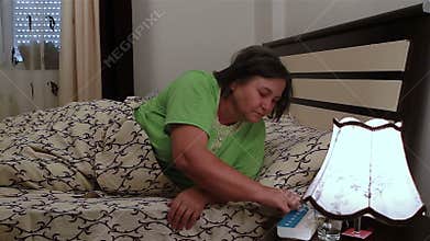 Restless sleeping of senior woman