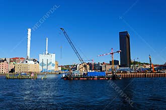 Roselundverket combined heat and power powerplant on bank of Gota river next to Alvstaden development construction site