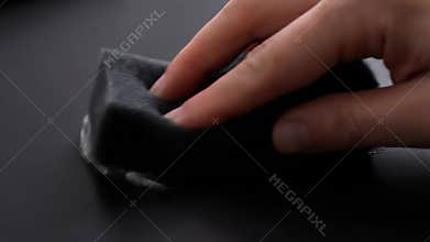 Using Black Sponge to Absorb Clear Gel on Dark Surface During Daytime