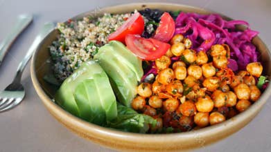 Healthy vegetarian bowl with chickpeas and vegetables