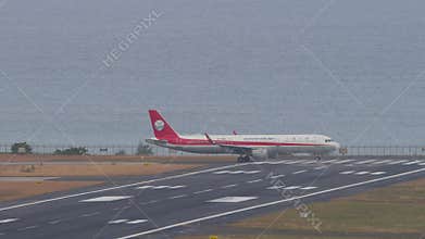 Sichuan Airlines Airbus A321 taxiing, side view