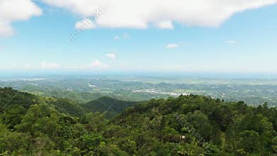 Aerial view of the historic Santa Ana Stone Tower showing it perched among lush green mountains