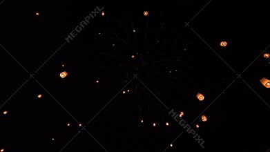 Sky lanterns with fireworks show in Loy Krathong Festival or Yi Peng Festival at Chiang Mai Thailand