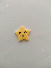 cute smiling yellow star charm illustration for crafts