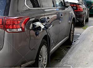 Electric Car Charging at Urban Station – Sustainable Transportation Concept