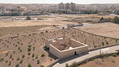 Drone aerial view of Meryem Ana Church near Midyat in Mardin Province, historic Syriac Orthodox heritage site with stone