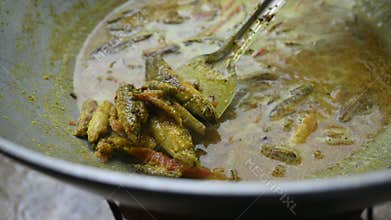 Small Snakehead or Channa orientalis fish curry.