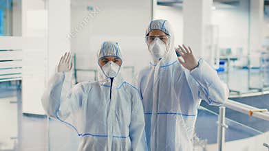 Disinfection team works in modern office during epidemic crisis response