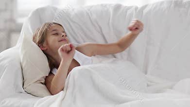 Pre-teen girl sleeping at home