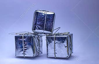 Stack of Shiny Silver Christmas Gift Boxes