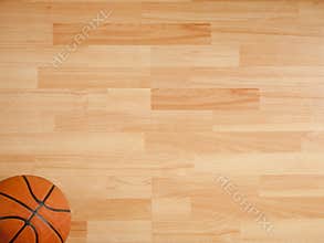 An official orange ball on a basketball court