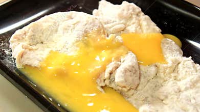 Coat the meat with flour and egg