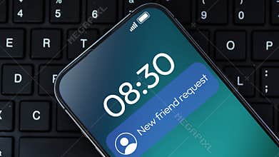 Close up animation of a smartphone screen showing a new friend request notification at 0830 on a computer