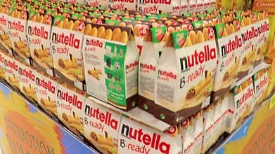 Inside Big C supermarket aisles shelves full of products Thailand