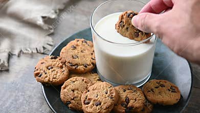 Dipping a Cookie into a Glass of Milk