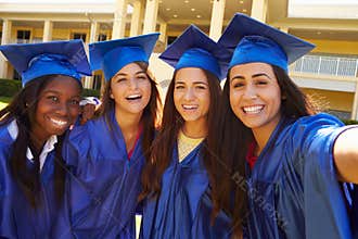 Group Of Female High School Students Celebrating Graduation