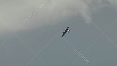 Yak-52 aircraft performs aerobatics at the BIAS 2024 air show.
