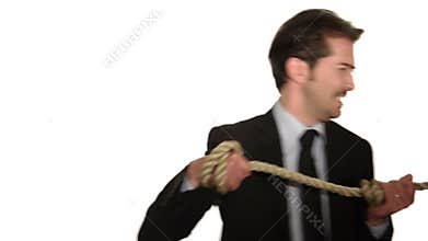 Businessman in tug of war concept