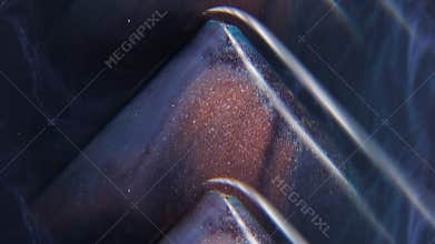 Shiny paint rainbow triangle neon particle water