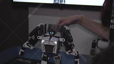 Handson Biped Robot Demonstration In Workshop, Display Of Humanoid Robot In Laboratory Environment With Technician