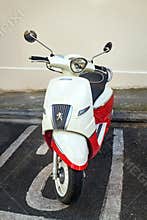 White And Red Peugeot Django Scooter At Parking