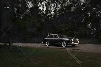 Old time car Mitsuoka Galue I in the park