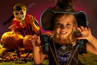Halloween party with children wearing costumes