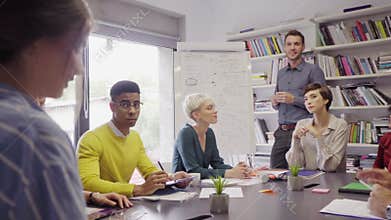Happy casual business team in meeting