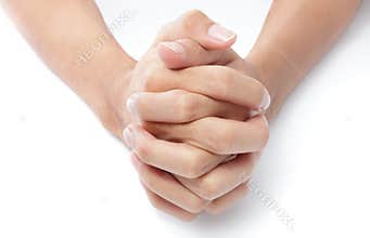 Folded hands praying