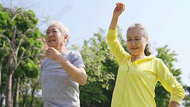 Asian old couple exercising outdoors