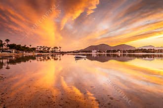 Amazing sunset and reflections at Puerto Alcudia, Mallorca