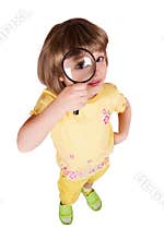 Little girl with magnifying glass