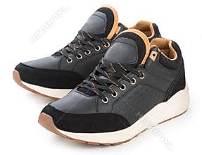 Pair of black mens sport shoes, sneakers isolated on a white background