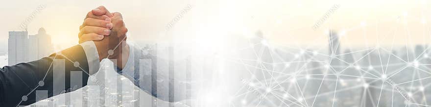 Double exposure business hand shake between two colleagues, greeting, dealing, merger and acquisition concept