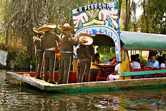 Mariachis on boat in Xochimilco, Mexico