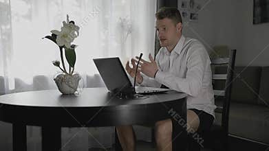 Webinar - man having online video conference call from home