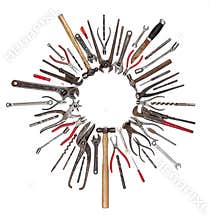 Old Rusty Tools Placed In A Circle 
