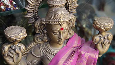 Hindu goddess lakshmi devi statue .hinduism goddesses Sarasvati, Lakshmi and Durga. Closeup of face of Goddess Durga