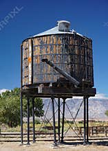 A historic wooden railroad water tank in Laws, California