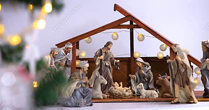Jesus Christ birth in stable Christmas scene with figures