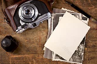 Vintage ink and pen, old photos and camera