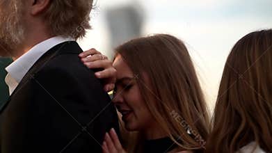 Woman is singing and suffering, mistress standing between couple, love relationship of three