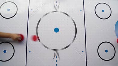 View top. air hockey. game for kids and adults at party in yard.