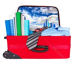 Travel blue business suitcase packed for trip