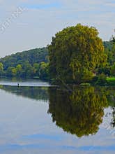 Europe, France, New Aquitaine, Charente,Confolens, fisherman on the river La Vienne