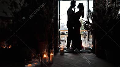 Romantic love date of young sexy couple hug passion desire on restaurant balcony