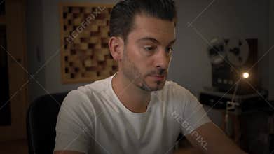 Closeup portrait of music sound mastering engeneer in his studio