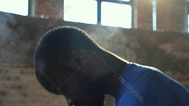 Closeup of male hands applying powder chalk magnesium at gym