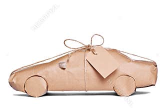 Car wrapped in brown paper cut out